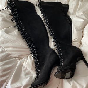Thigh high lace up boots